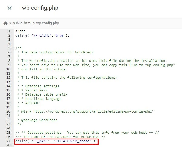 Le fichier wp-config.php dans le gestionnaire de fichiers de hPanel, avec la section Nom de la base de données en surbrillance.